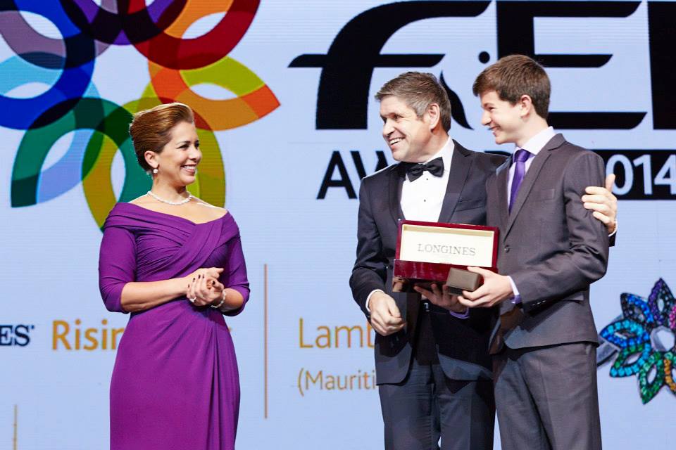 Mauritius' vaulter Lambert Leclezio (right) receives the "Longines Rising Star Award" ©FEI