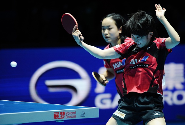 Mima Ito (left) and Miu Hirano (right) in action during the women's doubles final ©Getty Images