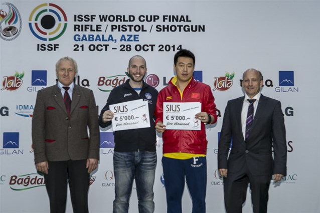Nicco Campriani of Italy and Pang Wei of China are awarded prizes following October's 2014 World Cup Final ©ISSF