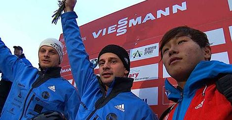 Sungbin Yun (right) won a historic bronze alongside Latvia's gold and silver medal winning Dukurs brothers ©FIBT