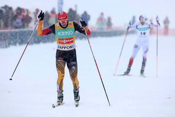 Eric Frenzel crosses the line in the cross-country race ©Getty Images