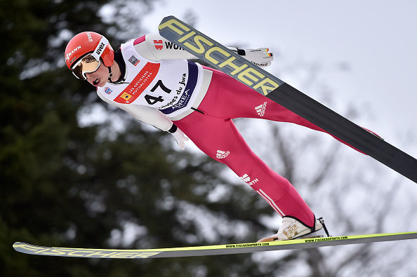 Eric Frenzel skied to the top of the podium at the Nordic Combined World Cup Triple following a fifth place finish in the ski jump ©Getty Images