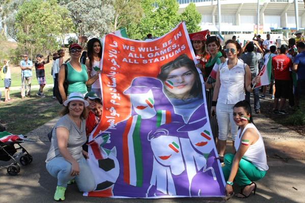 Fans during the 2015 Asian Cup in Australia hold a banner in support of Ghoncheh Ghavami ©Twitter