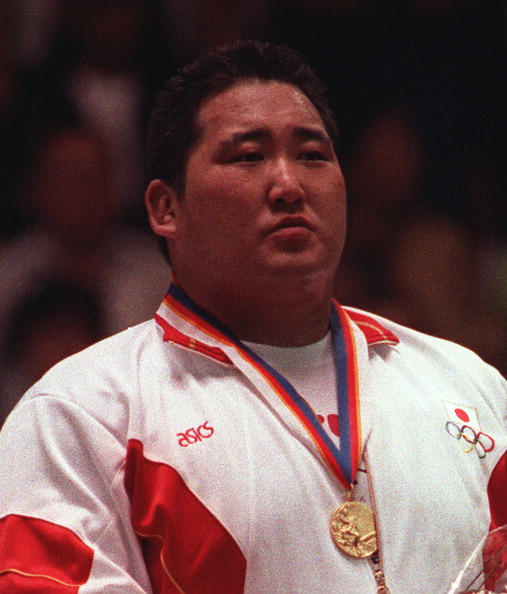 Hitoshi Saito proudly wears his gold medal after triumphing in the men's judo over 95 kilogram category at the Seoul 1988 Olympic Games ©Getty Images