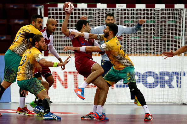 Kamaladin Mallash of Qatar attacks during the Group A opener ©Getty Images