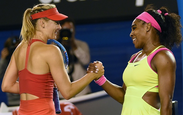 Maria Sharapova and Serena Williams embrace at the net after the latter's straight sets triumph in the Australian Open final ©AFP/Getty Images