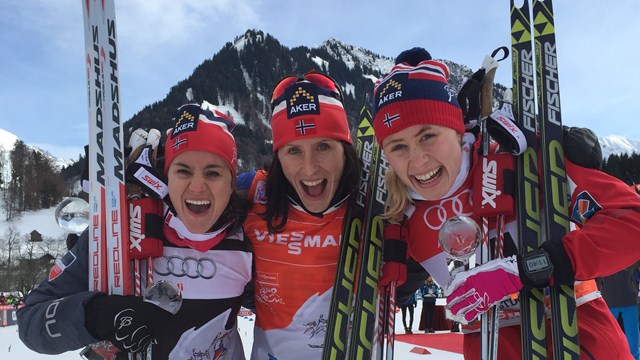 Marit Bjørgen (centre) celebrates after a Norwegian clean sweep in the prologue of the Tour de Ski ©FIS