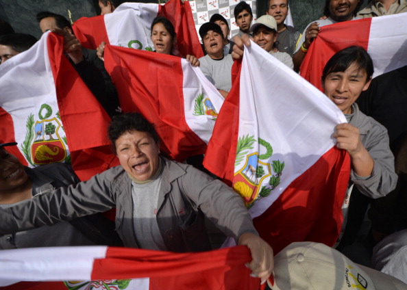 Officials celebrating Lima's victory in the 2019 Pan American Games race. PASO officials will visit Peru to investigate reported problems with the bid, it has today been announced ©Getty Images