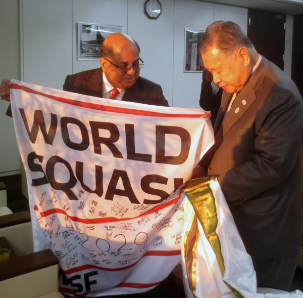 Ramachandran presented Mori with a WSF flag signed by all the top women players competing in the recent Womens World Team Championship ©WSF