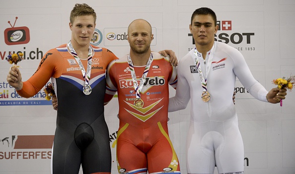 Russian Denis Dmitriev (centre) beat Jeffrey Hoogland (left) and home favourite Fabian Puerta (right) in the men's sprint ©AFP/Getty Images