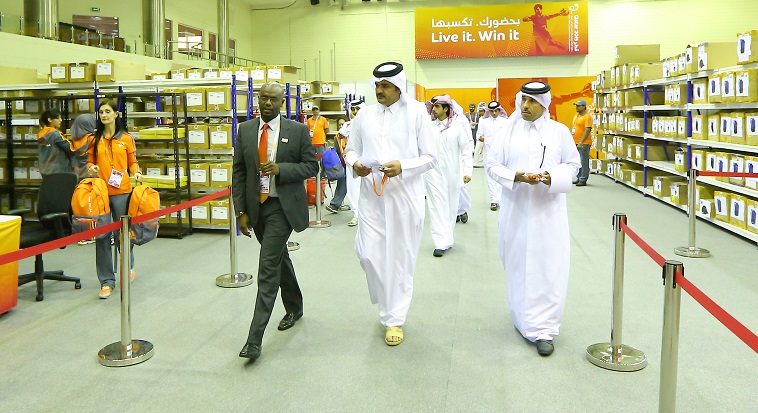 Sheikh Joaan bin Hamad Al Thani and Thani Abdulrahman Al Kuwari visited the uniforms and accreditation centre as part of the tour ©Qatar 2015