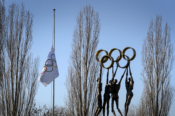 The IOC flag was flown at half-mast for three days in a tribute to He Zhenliang ©Getty Images