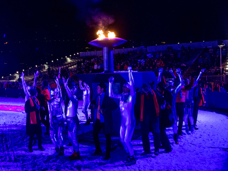 The Opening Ceremony performers at the EYOF surround the Olympic flame ©ÖOC/GEPA