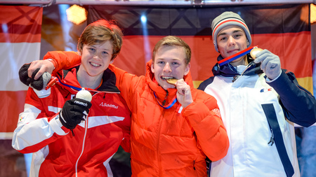 Willi Hengelhaupt (centre) won two of Germany's six gold medals, including that from today's Nordic combined boys' event ©ÖOC/GEPA