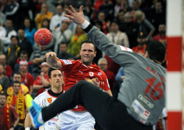Lars Christiansen, pictured scoring for Denmark en route to their victory at the 2012 European Handball Championship, will be a TV commentator at the Qatar 2015 World Championship and he expects France, the 2008 and 2012 Olympic champions, to win their third title in the space of seven years ©Getty Images