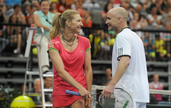 Steffi Graf and Andre Agassi play doubles in a charity exhibition match in 2011 ©AFP/Getty Images