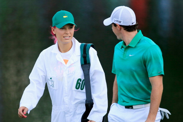 Former world No1 tennis player Caroline Wozniacki caddies for her boyfriend Rory McIlroy. But their planned marriage was later called off and they have split up ©Getty Images