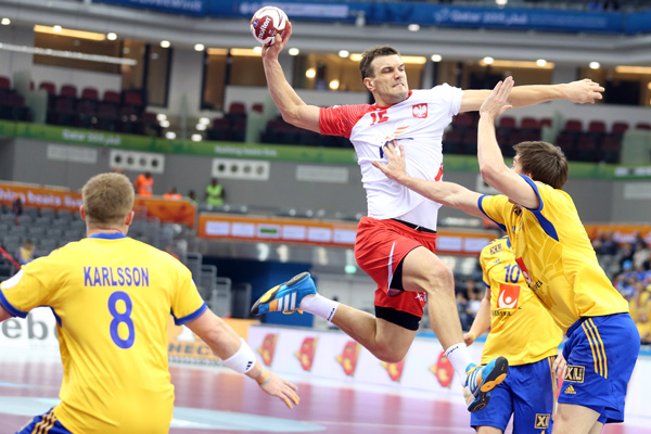 Poland earned a quarter-final meeting with joint top seeds Croatia after beating Olympic 2012 silver medallists Sweden 24-20 ©Qatar2015