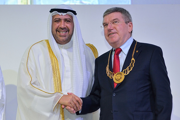 Sheikh Ahmad vowed to continue to work closely with the IOC and its President Thomas Bach, pictured receiving an ANOC Merit Award during the General Assembly ©Getty Images