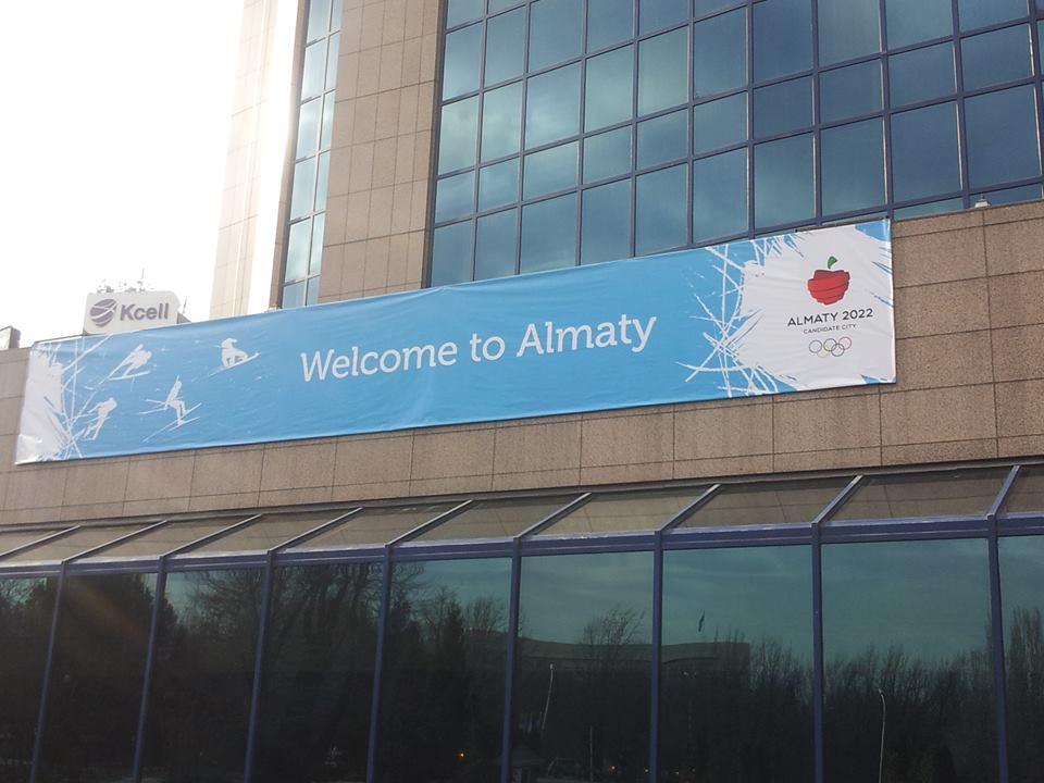A sign promoting Almaty's 2022 bid outside the InterContinental Hotel in the city ©ITG
