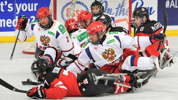 Russia and Canada clash during the semi-final showdown at the World Sledge Hockey Challenge ©Hockey Canada