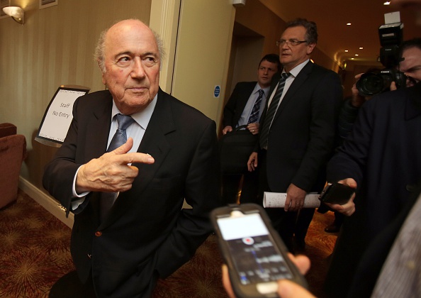 FIFA President Sepp Blatter has claimed the 2022 World Cup will go on no later than December 18 ©AFP/Getty Images