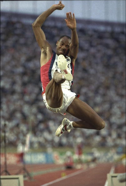 Mike Powell in flight during the 1991 Wolld Championships long jump final where he finally beat Carl Lewis, setting a world record of 8.95m ©Getty Images