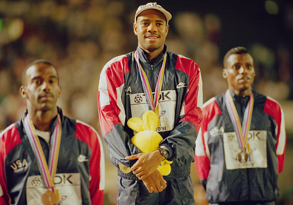 Mike Powell on the podium after his 1991 world title win, flanked by Carl Lewis (right) and bronze medallist Lary Myricks ©Hulton Collection/Getty Images