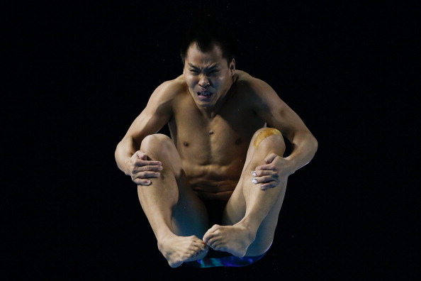 China's He Chong did just enough to win the men's 3m springboard event ©Getty Images