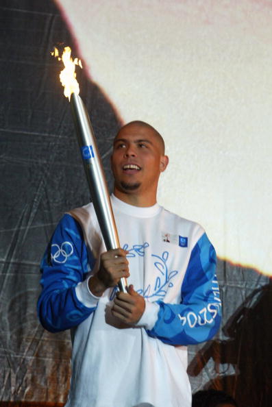Another football legend, Ronaldo, carrying the Torch in 2004 before lighting the Cauldron in Rio de Janeiro ©Getty Images