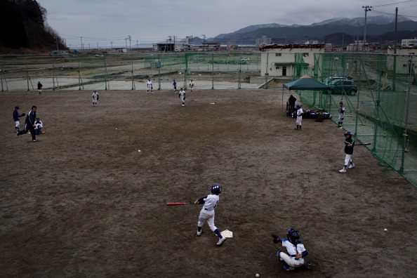 Boys practice baseball in Fukushima in 2012, just one year after the devastating earthquake and tsunami ©Getty Images