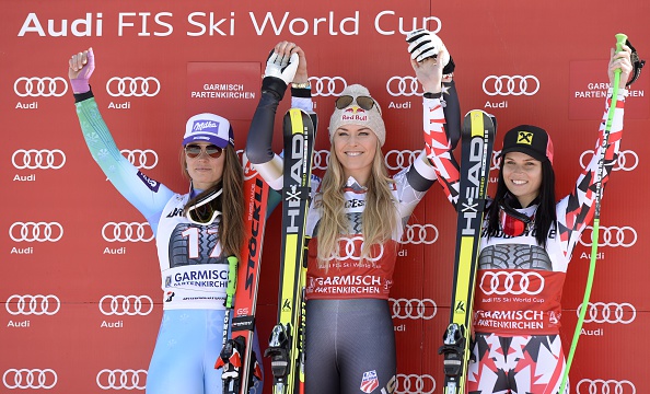 Lindsey Vonn flanked by her key rivals Tina Maze (left) and Anna Fenninger (right) on the podium after her victory ©AFP/Getty Images