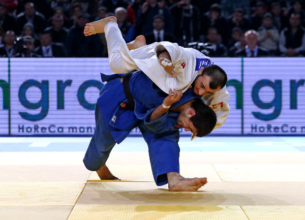 Russian Alan Khubetsov (blue) ousted home favourite Ushangi Margiani to take gold in the under 81kg category in what was a tense final ©IJF