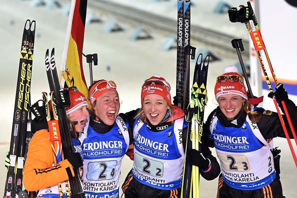 The German team of Franziska Hildebrand (left), Laura Dahlmeier (centre, left), Franziska Preuss (centre, right), and Vanessa Hinz (right) celebrate their success ©Getty Images