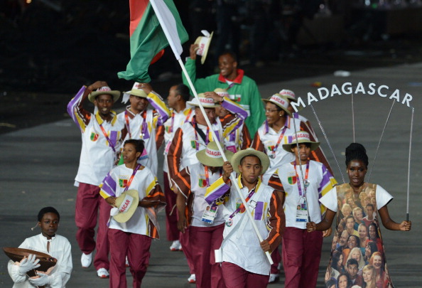 The Madagascan team led by Flagbearer Fetra Ratsimiziva, march at the Opening Ceremony of the London 2012 Olympic Games ©AFP/Getty Images