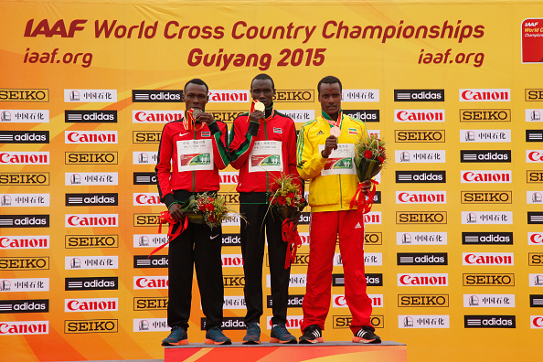 Kenya's winner Geoffrey Kamworor on the podium at the IAAF World Cross Country Championships in Guiyang ©Getty Images