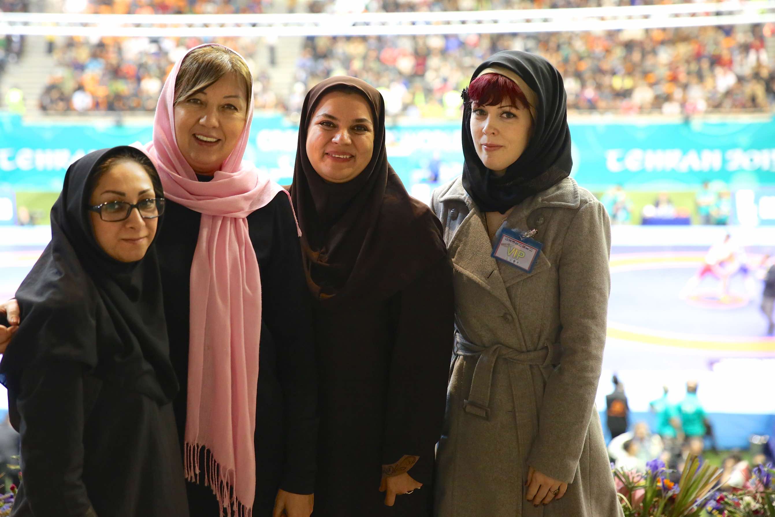 Iranian Wrestling Federation international department head Farnaz Panahi and United World Wrestling Bureau member Rodica Yaksi attended the Greco-Roman World Cup in Tehran with Badrolmolouk Kahrangi and a fellow dignitary ©Tim Foley/United World Wrestling