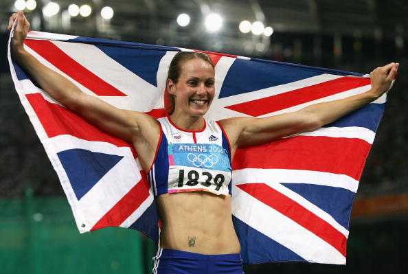Kelly Sotherton celebrates after winning a heptathlon bronze medal at the Athens 2004 Olympics only for her coach Charles van Commenee to later reduce her to tears when he called her "a wimp" for not getting the silver ©Getty Images