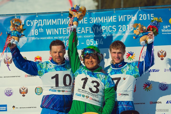 Japanese veteran Noboru Harada (centre) claimed his second gold of the Deaflympics with victory in the men's snowboarding parallel slalom ©Ugra 2015