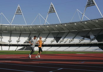 Olympic stadium_first_lap_with_Sebastian_Coe_and_Hannah_England_October_3_2011