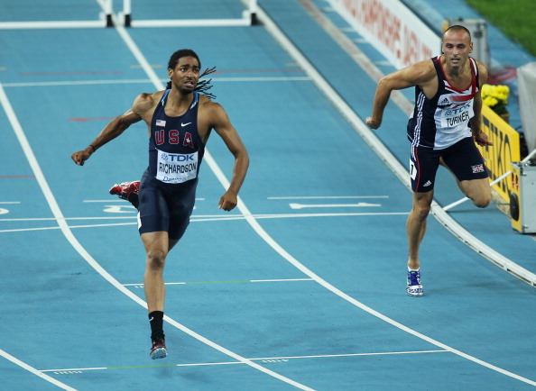 Andy_Turner_crosses_the_line_behind_Jason_Richardson_World_Championships_Daegu_August_29_2011