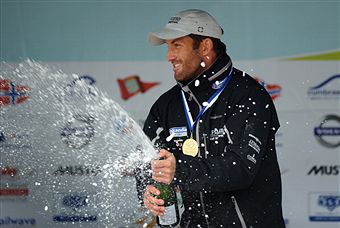 Ben_Ainslie_celebrates_with_champagne_winning_Skandia_Sail_for_Gold_June_11_2011