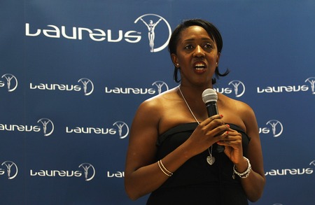 Connie_Henry_in_front_of_Laureus_logo