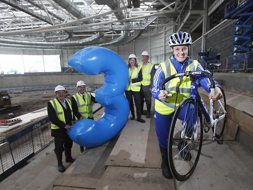 Jenny_Davis_and_Glasgow_2014_officials_at_the_under_construction_Sir_Chris_Hoy_Velodrome_July_20_2011