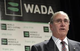John Fahey in front of WADA logo
