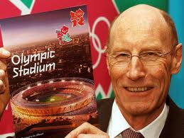John_Armitt_with_brochure_of_Olympic_Stadium