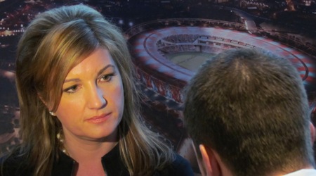 Karren_Brady_being_interviewed_after_Olympic_Stadium_in_front_of_mock_up_announcement_February_11_2011