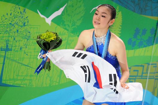 Kim_Yu-Na_with_Korean_flag
