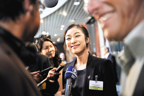 Kim_Yu_Na_being_interviewed_Olympic_Museum_May_18_2011