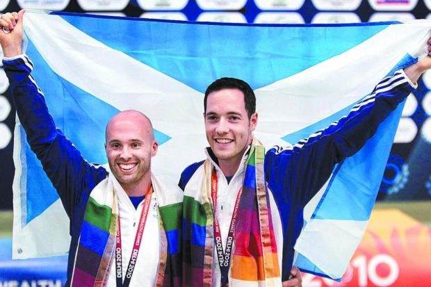 Neil_Sirton_on_right_with_Scottish_flag